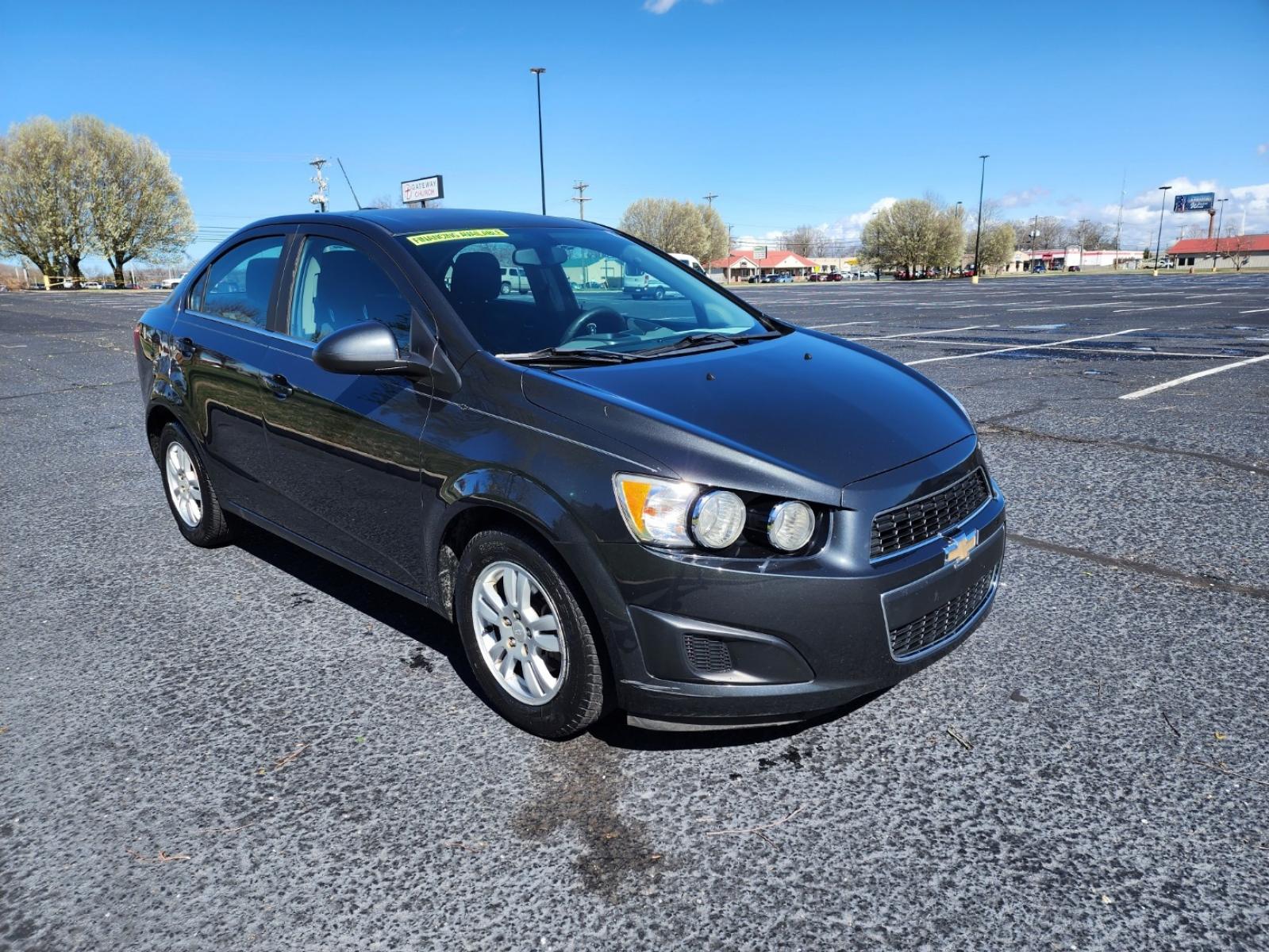 2015 GRAY /Gray CHEVROLET SONIC LT (1G1JC5SH7F4) with an 1.8L engine, Automatic transmission, located at 1221 Madison St., Shelbyville, TN, 37160, (931) 680-9439, 0.000000, 0.000000 - Photo #1
