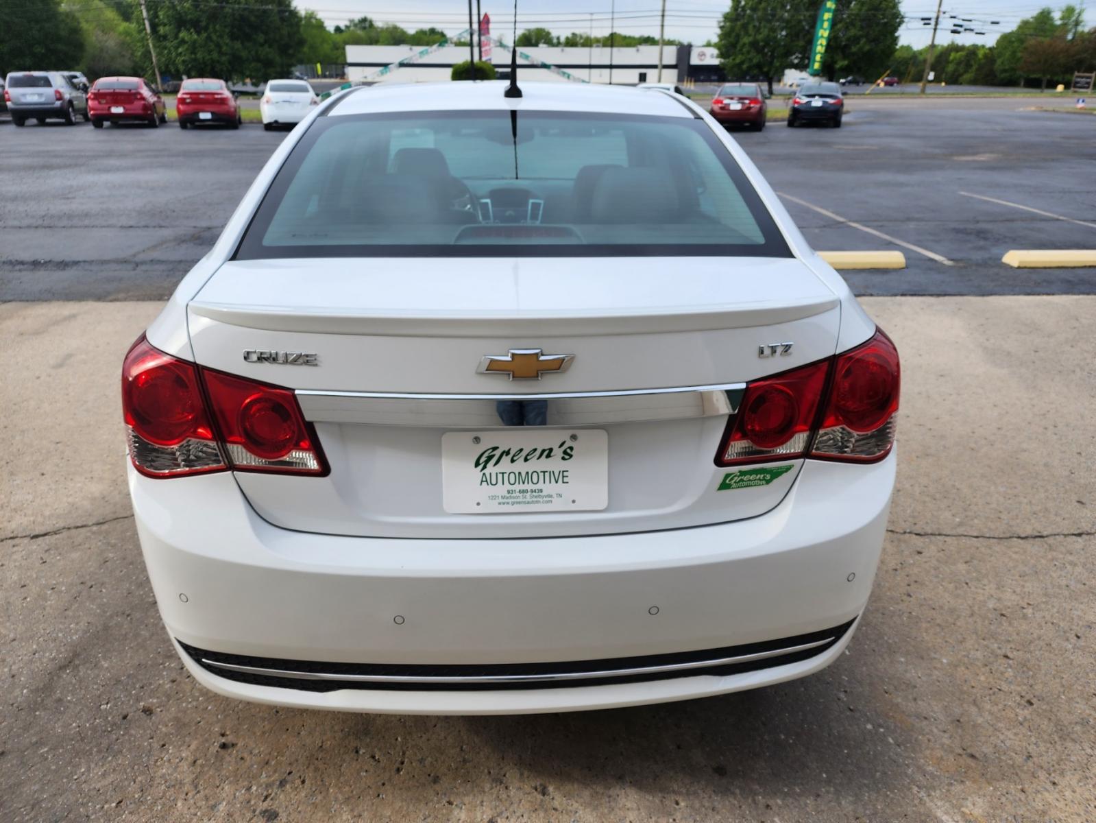 2012 WHITE /Black Chevrolet Cruze LTZ (1G1PH5SC1C7) with an 1.4L L4 DOHC 16V TURBO engine, 6-Speed Automatic transmission, located at 1221 Madison St., Shelbyville, TN, 37160, (931) 680-9439, 0.000000, 0.000000 - Photo #2