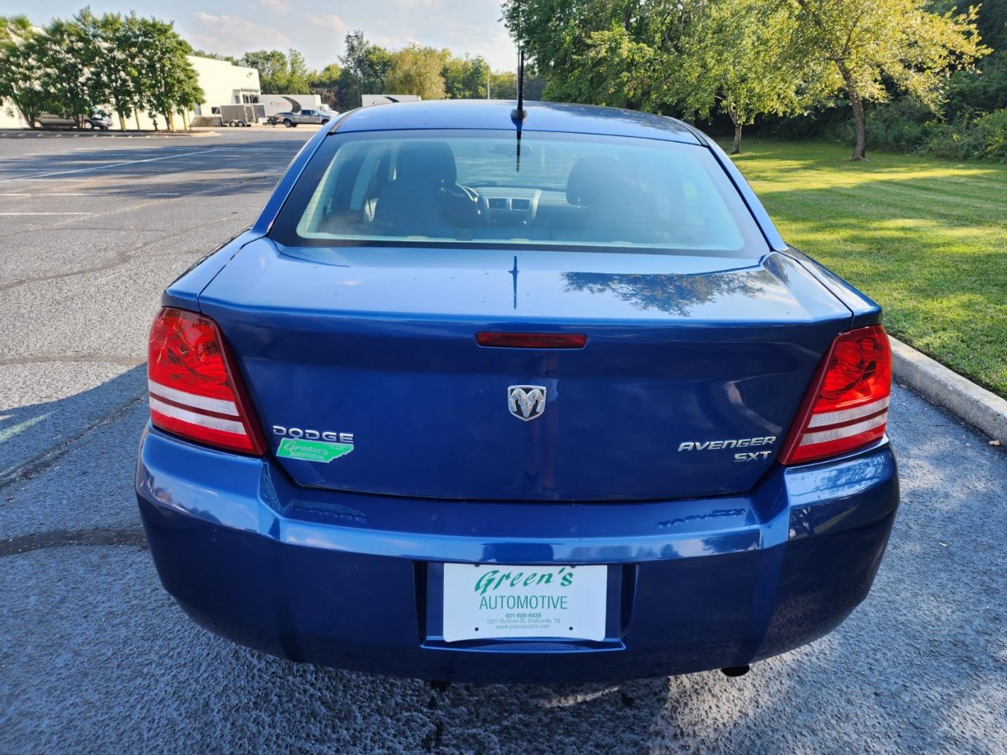 2010 Blue /Black Dodge Avenger SXT (1B3CC4FB8AN) with an 2.4L L4 DOHC 16V engine, 4-Speed Automatic transmission, located at 1221 Madison St., Shelbyville, TN, 37160, (931) 680-9439, 0.000000, 0.000000 - Photo#2