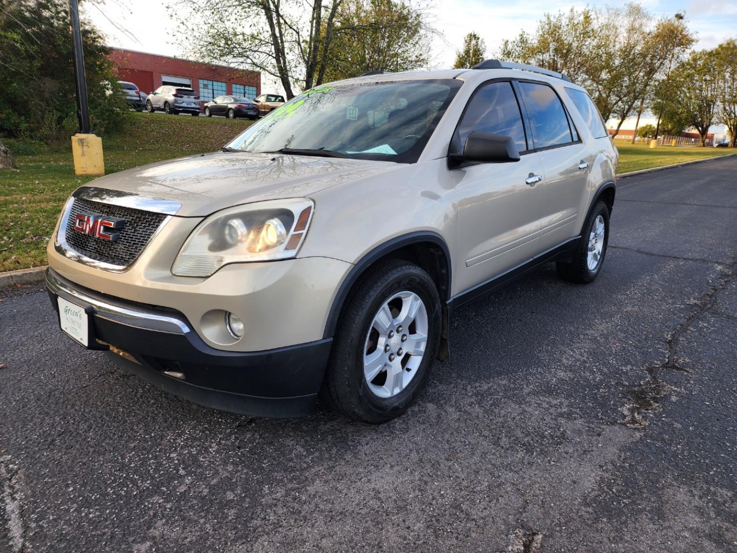 2011 Tan /Black GMC Acadia SLE-2 FWD (1GKKRPED6BJ) with an 3.6L V6 DOHC 24V engine, 6-Speed Automatic transmission, located at 1221 Madison St., Shelbyville, TN, 37160, (931) 680-9439, 0.000000, 0.000000 - Photo#0