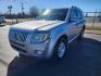 2010 Silver /Black Mercury Mariner Premier V6 2WD (4M2CN8HG3AK) with an 3.0 V-6 engine, 6-Speed Automatic transmission, located at 1221 Madison St., Shelbyville, TN, 37160, (931) 680-9439, 0.000000, 0.000000 - Photo#0