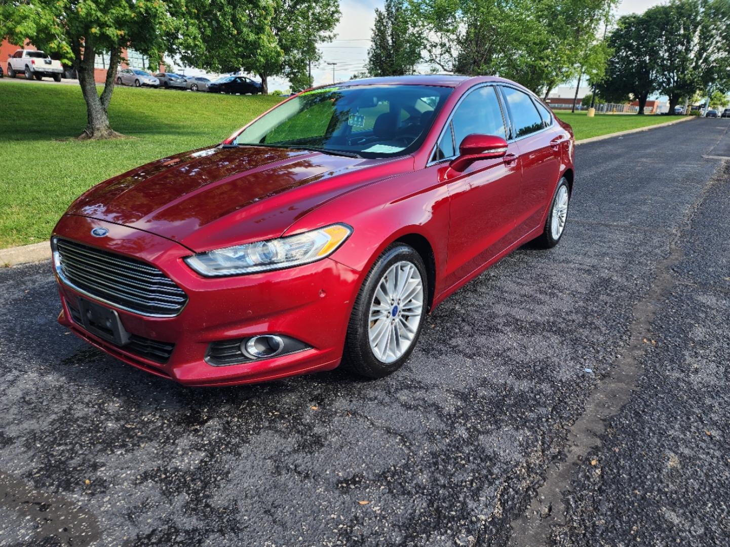 2014 RED /Black Ford Fusion SE (3FA6P0H90ER) with an 2.0L L4 DOHC 16V engine, Automatic transmission, located at 1221 Madison St., Shelbyville, TN, 37160, (931) 680-9439, 0.000000, 0.000000 - Photo#0
