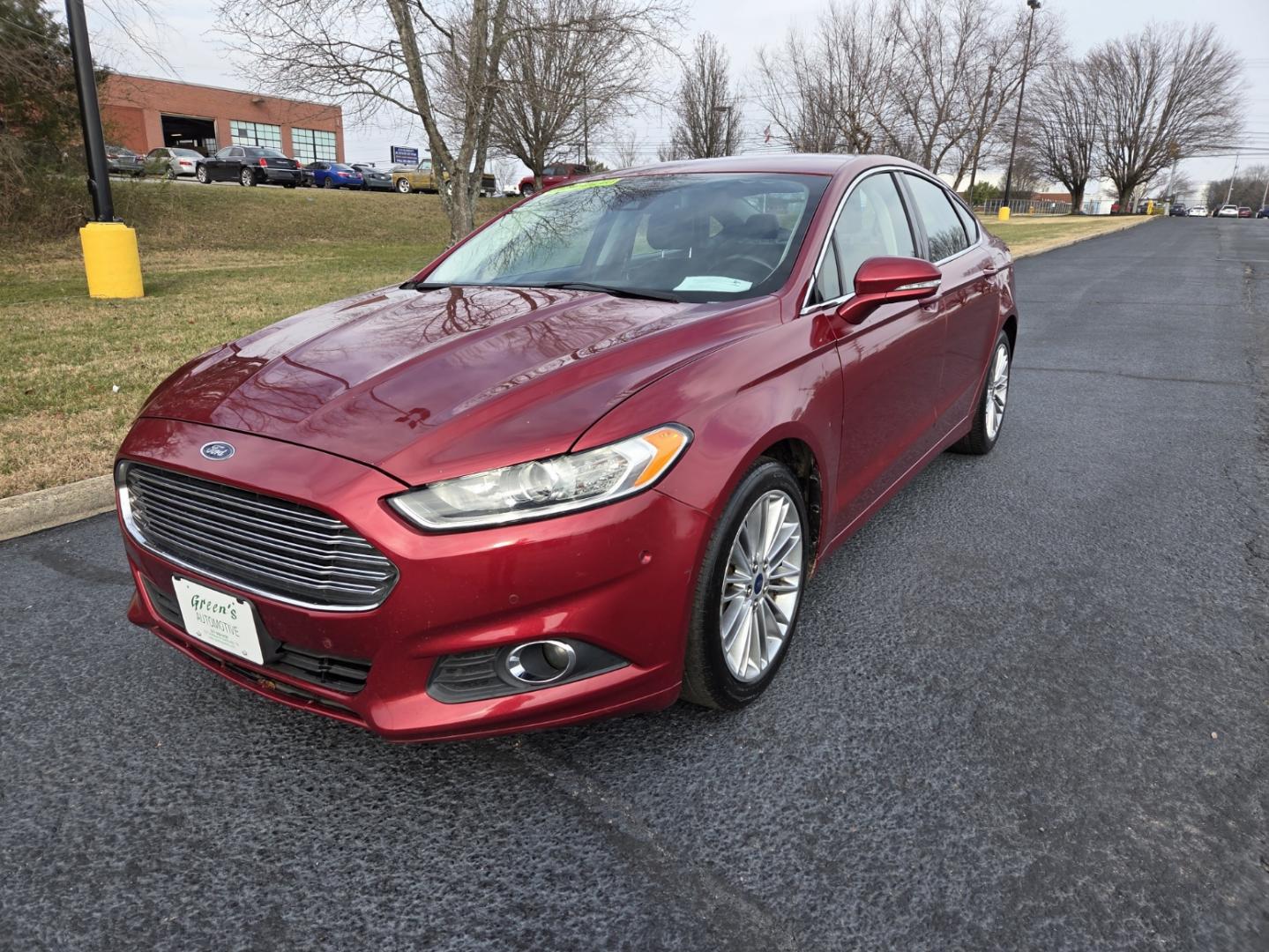 2014 RED /Black Ford Fusion SE (3FA6P0H90ER) with an 2.0L L4 DOHC 16V engine, Automatic transmission, located at 1221 Madison St., Shelbyville, TN, 37160, (931) 680-9439, 0.000000, 0.000000 - Photo#0