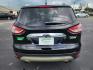 2016 Black /Black Ford Escape Titanium FWD (1FMCU0JX3GU) with an 1.6L L4 DOHC 16V engine, 6-Speed Automatic transmission, located at 1221 Madison St., Shelbyville, TN, 37160, (931) 680-9439, 0.000000, 0.000000 - Photo#2