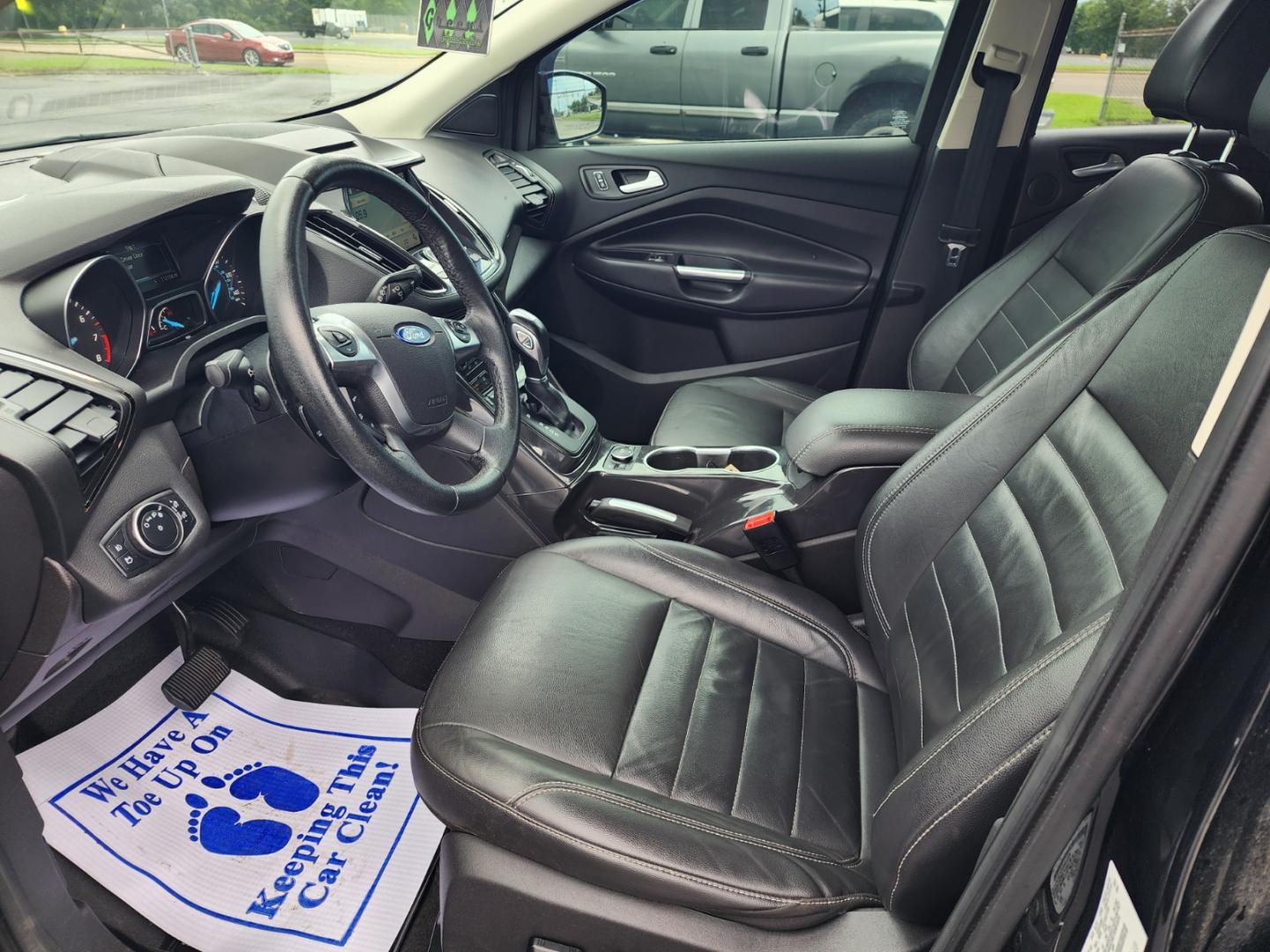 2016 Black /Black Ford Escape Titanium FWD (1FMCU0JX3GU) with an 1.6L L4 DOHC 16V engine, 6-Speed Automatic transmission, located at 1221 Madison St., Shelbyville, TN, 37160, (931) 680-9439, 0.000000, 0.000000 - Photo#5