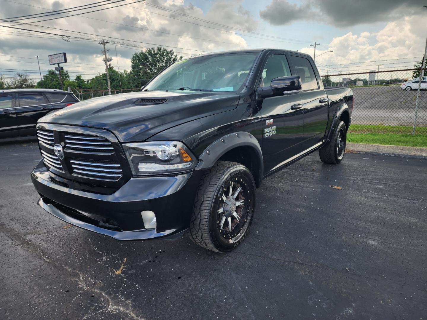 2013 Black /Black RAM 1500 Sport Crew Cab SWB 4WD (1C6RR7MT3DS) with an 5.7L V8 OHV 16V engine, 6-Speed Automatic transmission, located at 1221 Madison St., Shelbyville, TN, 37160, (931) 680-9439, 0.000000, 0.000000 - Photo#0