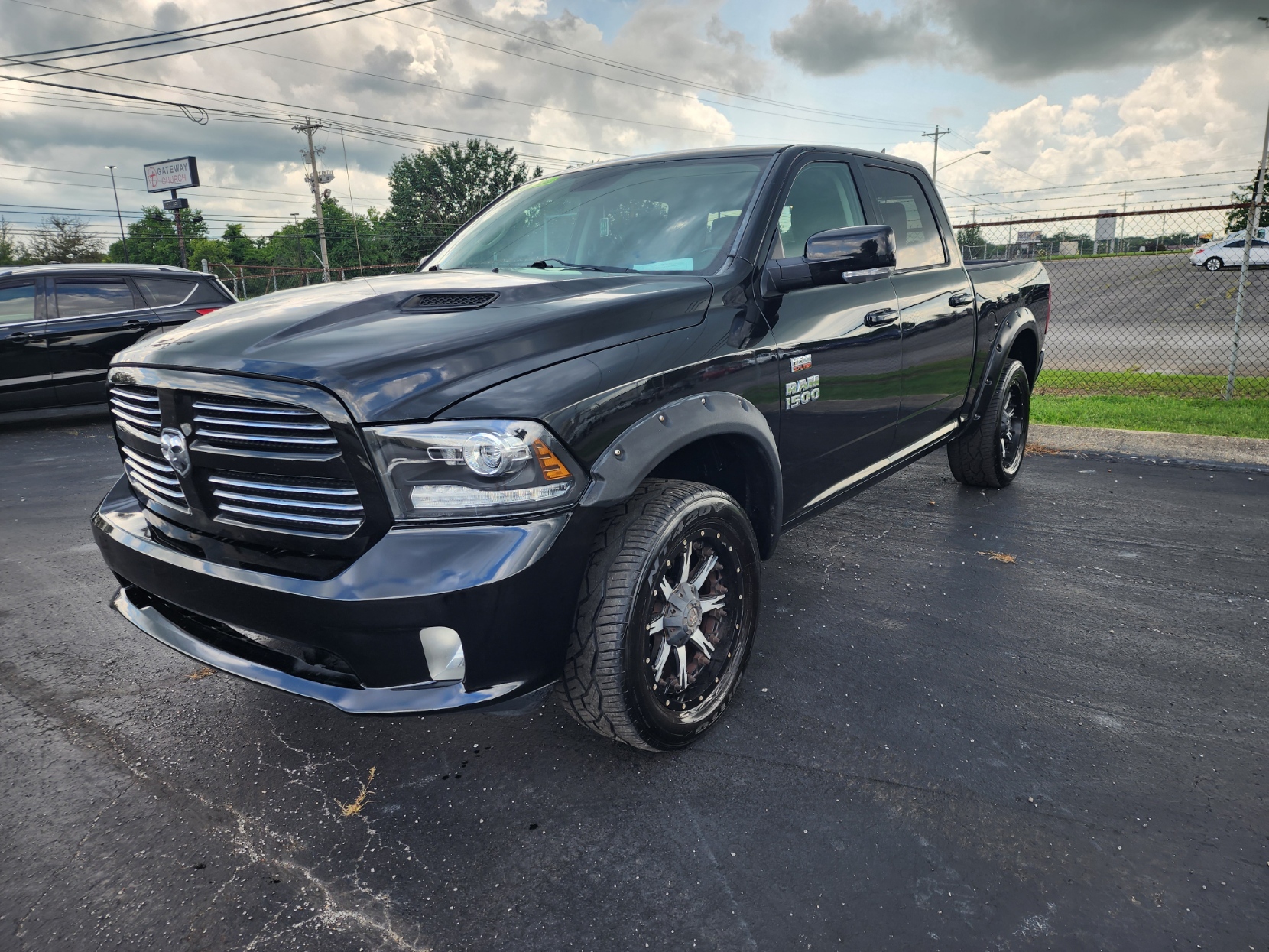 photo of 2013 RAM 1500 Sport Crew Cab SWB 4WD