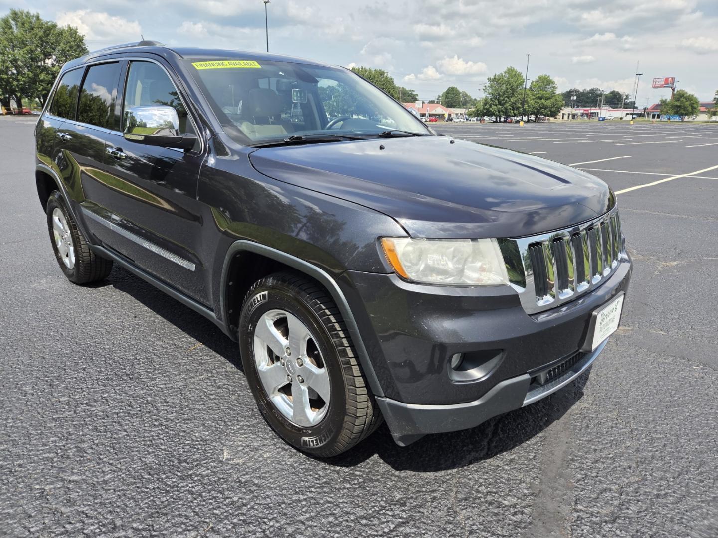 2012 Blue /Beige Jeep Grand Cherokee Limited 2WD (1C4RJEBG7CC) with an 3.6L V6 DOHC 24V engine, 5-Speed Automatic transmission, located at 1221 Madison St., Shelbyville, TN, 37160, (931) 680-9439, 0.000000, 0.000000 - Photo#1