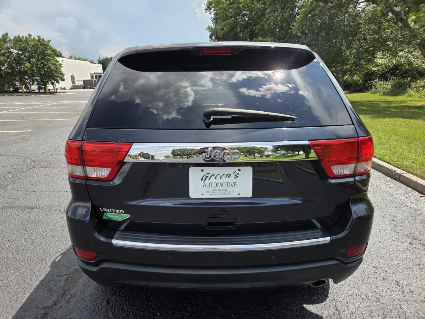2012 Blue /Beige Jeep Grand Cherokee Limited 2WD (1C4RJEBG7CC) with an 3.6L V6 DOHC 24V engine, 5-Speed Automatic transmission, located at 1221 Madison St., Shelbyville, TN, 37160, (931) 680-9439, 0.000000, 0.000000 - Photo#2