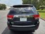 2012 Blue /Beige Jeep Grand Cherokee Limited 2WD (1C4RJEBG7CC) with an 3.6L V6 DOHC 24V engine, 5-Speed Automatic transmission, located at 1221 Madison St., Shelbyville, TN, 37160, (931) 680-9439, 0.000000, 0.000000 - Photo#2