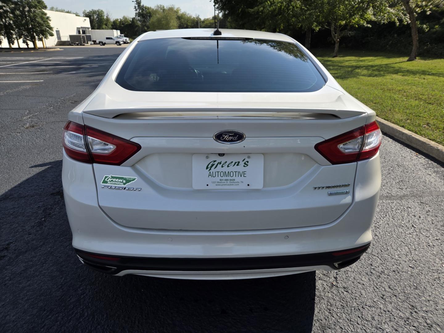 2014 WHITE /White Ford Fusion Titanium (3FA6P0K98ER) with an 2.0L L4 DOHC 16V engine, Automatic transmission, located at 1221 Madison St., Shelbyville, TN, 37160, (931) 680-9439, 0.000000, 0.000000 - Photo#2