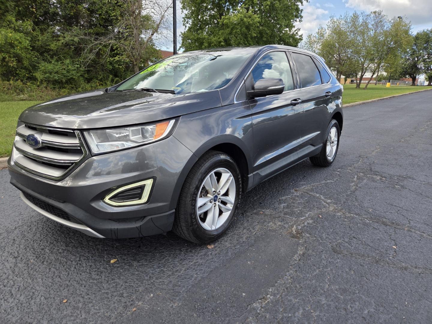 2015 Gray /Black Ford Edge SEL AWD (2FMTK4J97FB) with an 2.0L L4 DOHC 16V engine, 6-Speed Automatic transmission, located at 1221 Madison St., Shelbyville, TN, 37160, (931) 680-9439, 0.000000, 0.000000 - Photo#0