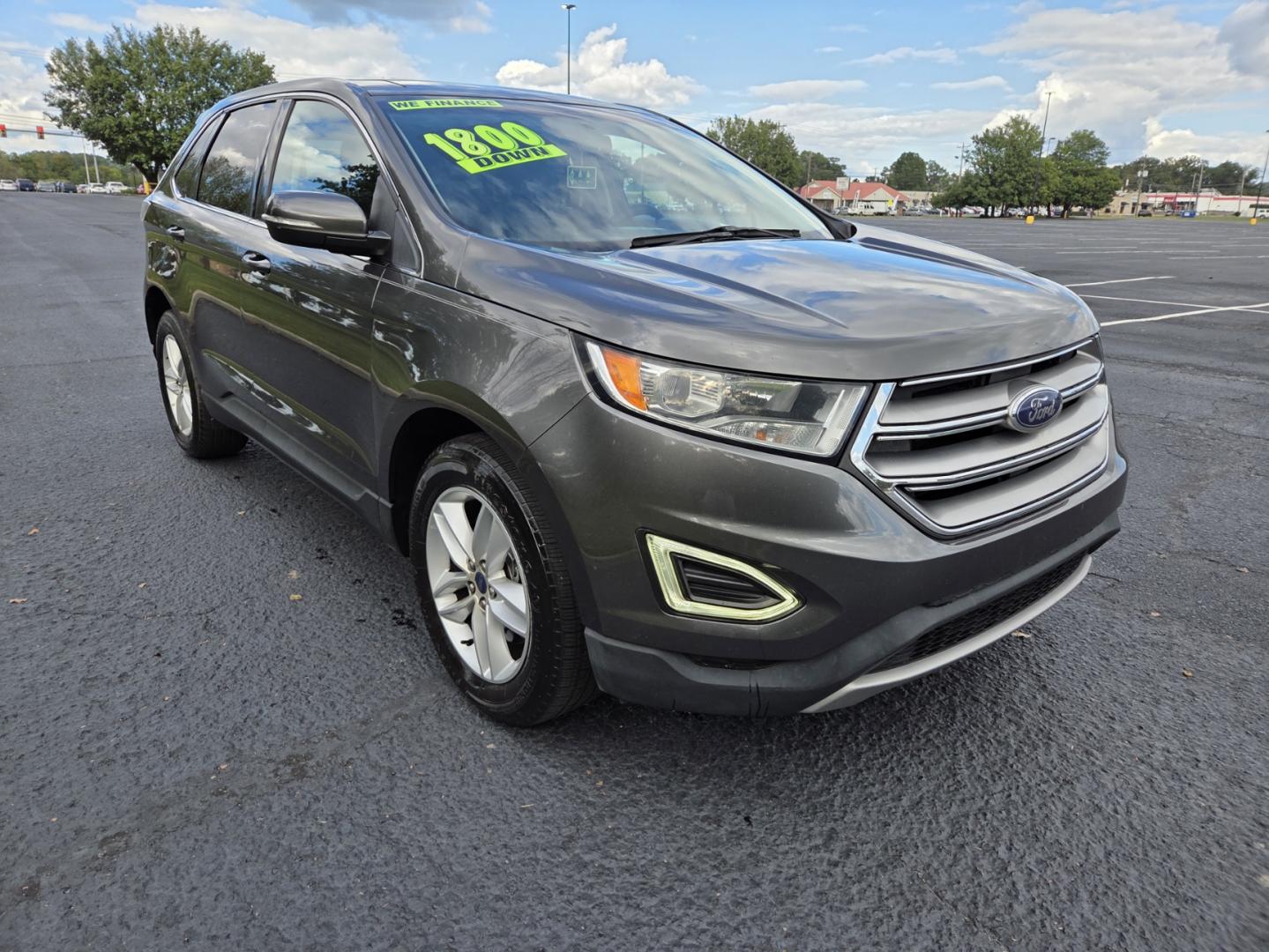 2015 Gray /Black Ford Edge SEL AWD (2FMTK4J97FB) with an 2.0L L4 DOHC 16V engine, 6-Speed Automatic transmission, located at 1221 Madison St., Shelbyville, TN, 37160, (931) 680-9439, 0.000000, 0.000000 - Photo#1