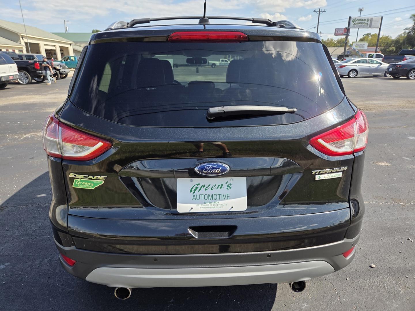 2013 BLACK /Black Ford Escape Titanium FWD (1FMCU0J95DU) with an 2.0L L4 DOHC 16V engine, 6-Speed Automatic transmission, located at 1221 Madison St., Shelbyville, TN, 37160, (931) 680-9439, 0.000000, 0.000000 - Photo#2