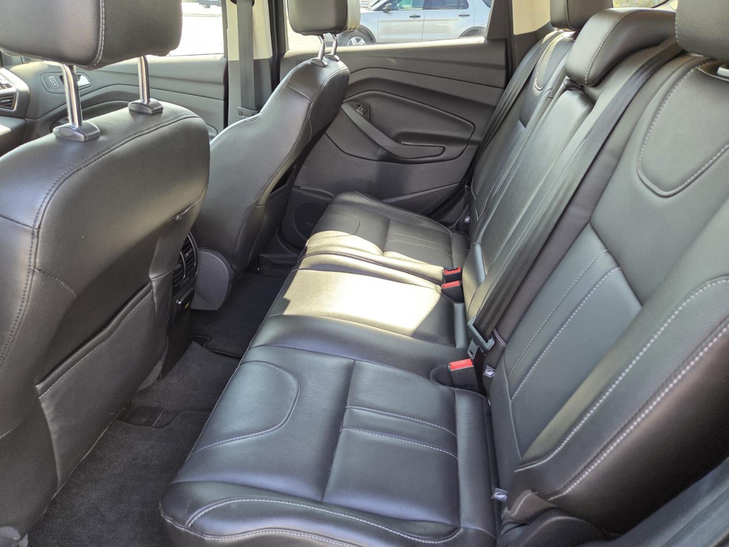 2013 BLACK /Black Ford Escape Titanium FWD (1FMCU0J95DU) with an 2.0L L4 DOHC 16V engine, 6-Speed Automatic transmission, located at 1221 Madison St., Shelbyville, TN, 37160, (931) 680-9439, 0.000000, 0.000000 - Photo#4