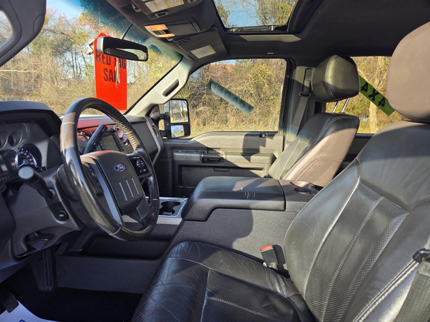 2012 BLACK /Black Ford F-250 SD Lariat Crew Cab 4WD (1FT7W2BT3CE) with an 6.7L V8 OHV 16V DIESEL engine, 6-Speed Automatic transmission, located at 1221 Madison St., Shelbyville, TN, 37160, (931) 680-9439, 0.000000, 0.000000 - Photo#7