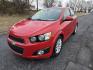 2014 RED /Gray Chevrolet Sonic LT Auto Sedan (1G1JC5SH8E4) with an 1.8L L4 DOHC 24V engine, 6-Speed Automatic transmission, located at 1221 Madison St., Shelbyville, TN, 37160, (931) 680-9439, 0.000000, 0.000000 - Photo#0