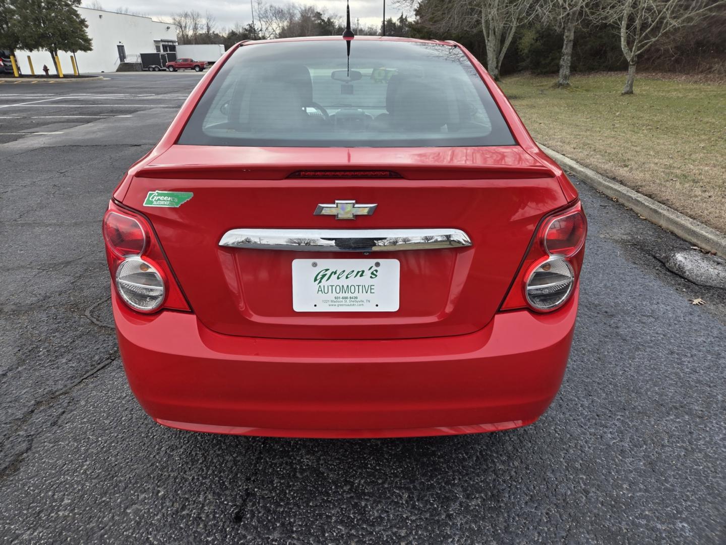 2014 RED /Gray Chevrolet Sonic LT Auto Sedan (1G1JC5SH8E4) with an 1.8L L4 DOHC 24V engine, 6-Speed Automatic transmission, located at 1221 Madison St., Shelbyville, TN, 37160, (931) 680-9439, 0.000000, 0.000000 - Photo#2