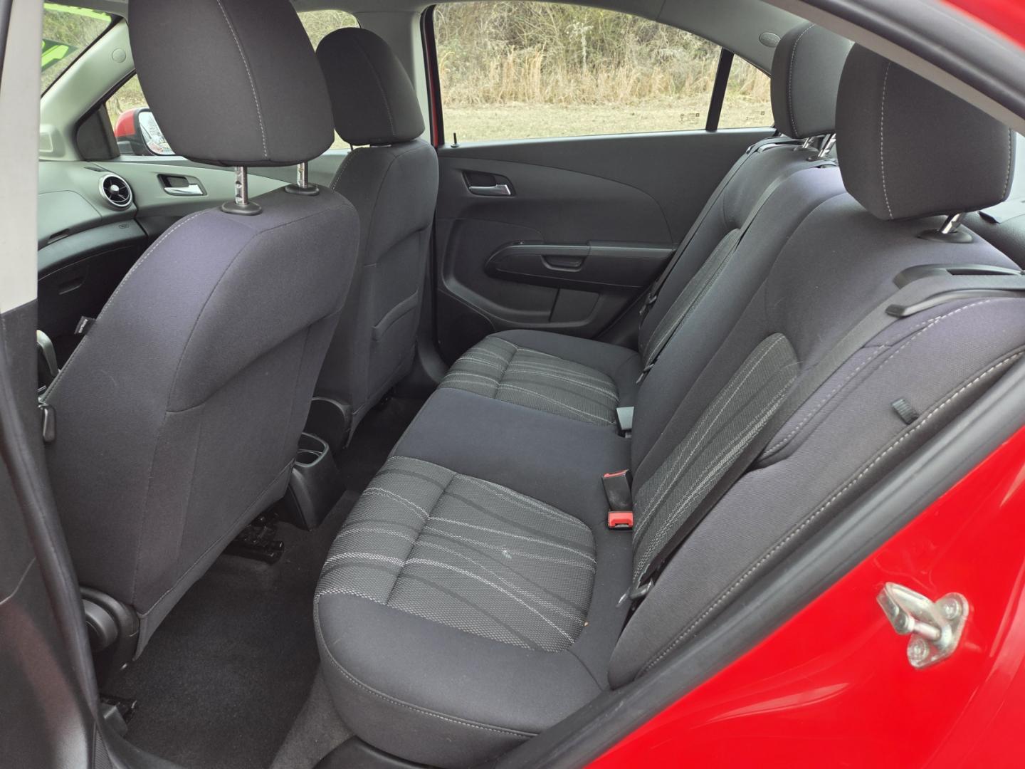 2014 RED /Gray Chevrolet Sonic LT Auto Sedan (1G1JC5SH8E4) with an 1.8L L4 DOHC 24V engine, 6-Speed Automatic transmission, located at 1221 Madison St., Shelbyville, TN, 37160, (931) 680-9439, 0.000000, 0.000000 - Photo#3