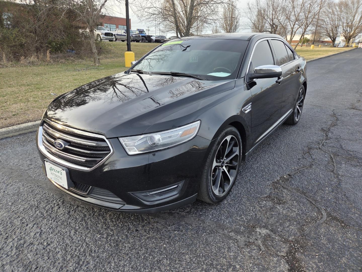 2014 BLACK /Black Ford Taurus Limited AWD (1FAHP2J83EG) with an 3.5L V6 DOHC 24V engine, 6-Speed Automatic transmission, located at 1221 Madison St., Shelbyville, TN, 37160, (931) 680-9439, 0.000000, 0.000000 - Photo#0