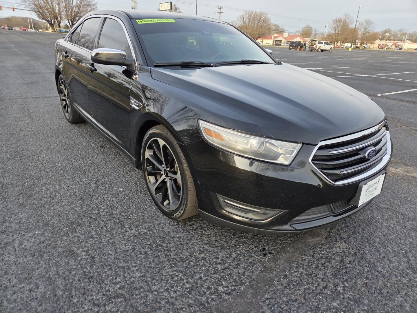2014 BLACK /Black Ford Taurus Limited AWD (1FAHP2J83EG) with an 3.5L V6 DOHC 24V engine, 6-Speed Automatic transmission, located at 1221 Madison St., Shelbyville, TN, 37160, (931) 680-9439, 0.000000, 0.000000 - Photo#1
