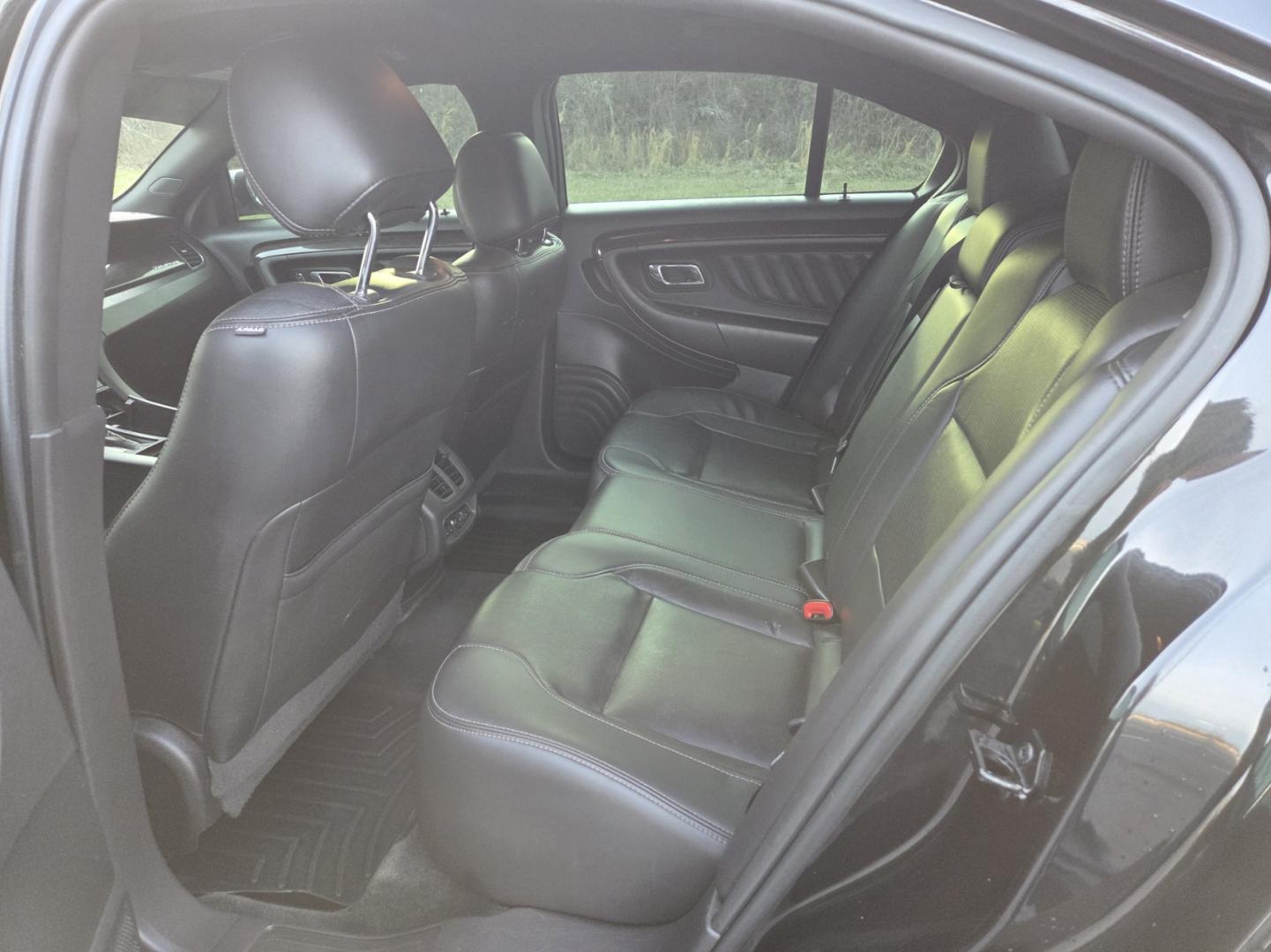 2014 BLACK /Black Ford Taurus Limited AWD (1FAHP2J83EG) with an 3.5L V6 DOHC 24V engine, 6-Speed Automatic transmission, located at 1221 Madison St., Shelbyville, TN, 37160, (931) 680-9439, 0.000000, 0.000000 - Photo#3