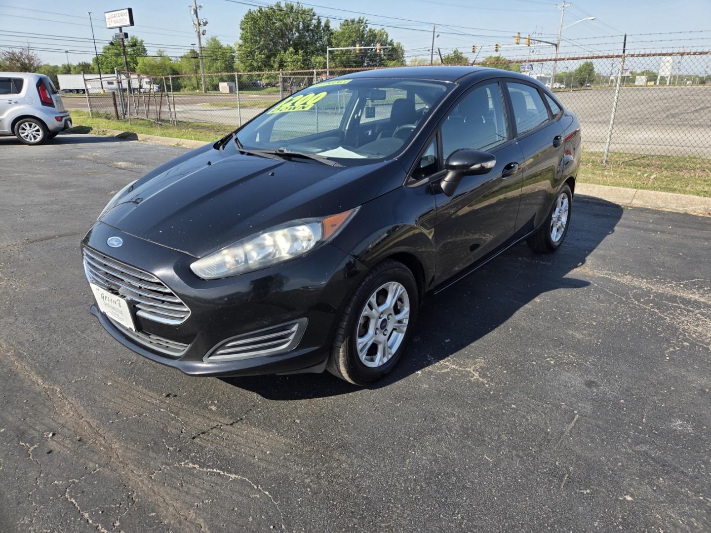 2016 BLACK /Black Ford Fiesta SE Sedan (3FADP4BJ1GM) with an 1.6L L4 DOHC 16V engine, Automatic transmission, located at 1221 Madison St., Shelbyville, TN, 37160, (931) 680-9439, 0.000000, 0.000000 - Photo#0