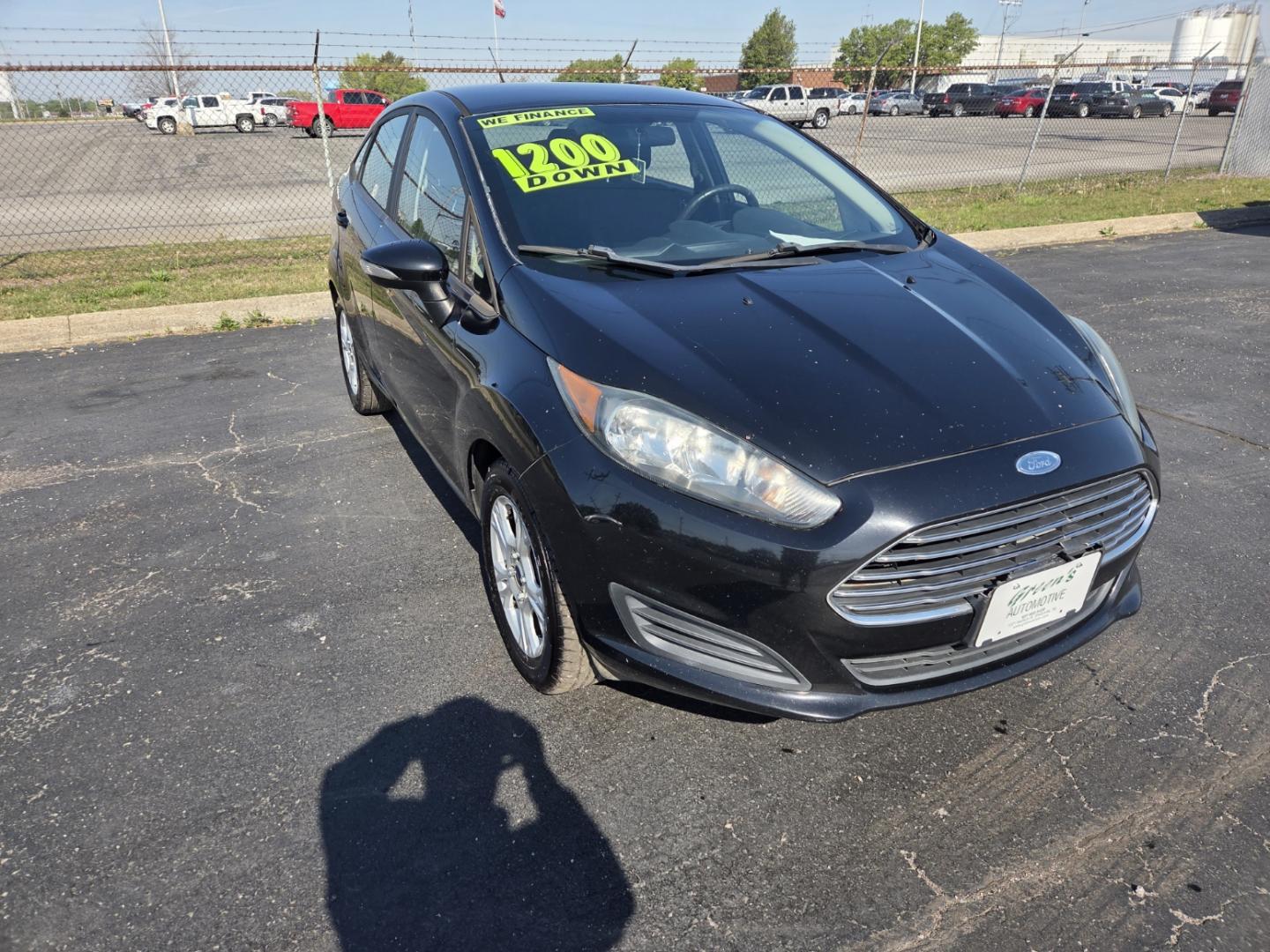 2016 BLACK /Black Ford Fiesta SE Sedan (3FADP4BJ1GM) with an 1.6L L4 DOHC 16V engine, Automatic transmission, located at 1221 Madison St., Shelbyville, TN, 37160, (931) 680-9439, 0.000000, 0.000000 - Photo#1