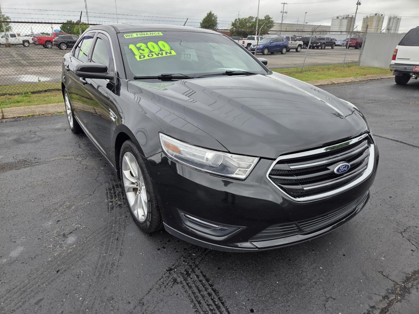 2013 BLACK /Black Ford Taurus SEL FWD (1FAHP2E80DG) with an 3.5L V6 DOHC 24V engine, 6-Speed Automatic transmission, located at 1221 Madison St., Shelbyville, TN, 37160, (931) 680-9439, 0.000000, 0.000000 - Photo#1