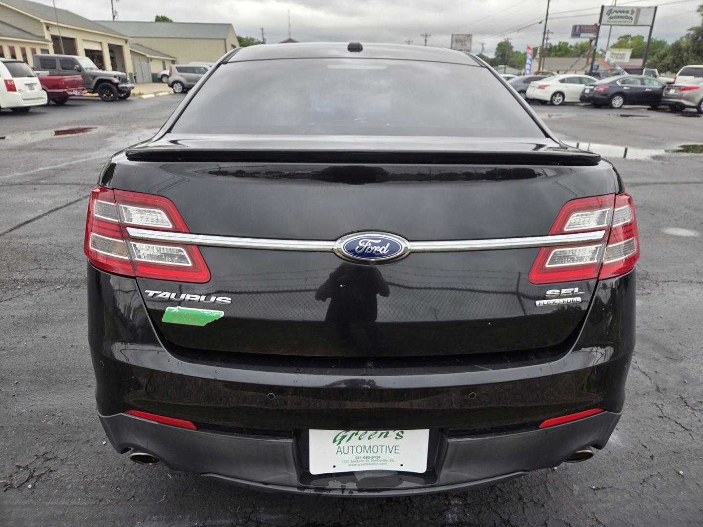 2013 BLACK /Black Ford Taurus SEL FWD (1FAHP2E80DG) with an 3.5L V6 DOHC 24V engine, 6-Speed Automatic transmission, located at 1221 Madison St., Shelbyville, TN, 37160, (931) 680-9439, 0.000000, 0.000000 - Photo#2