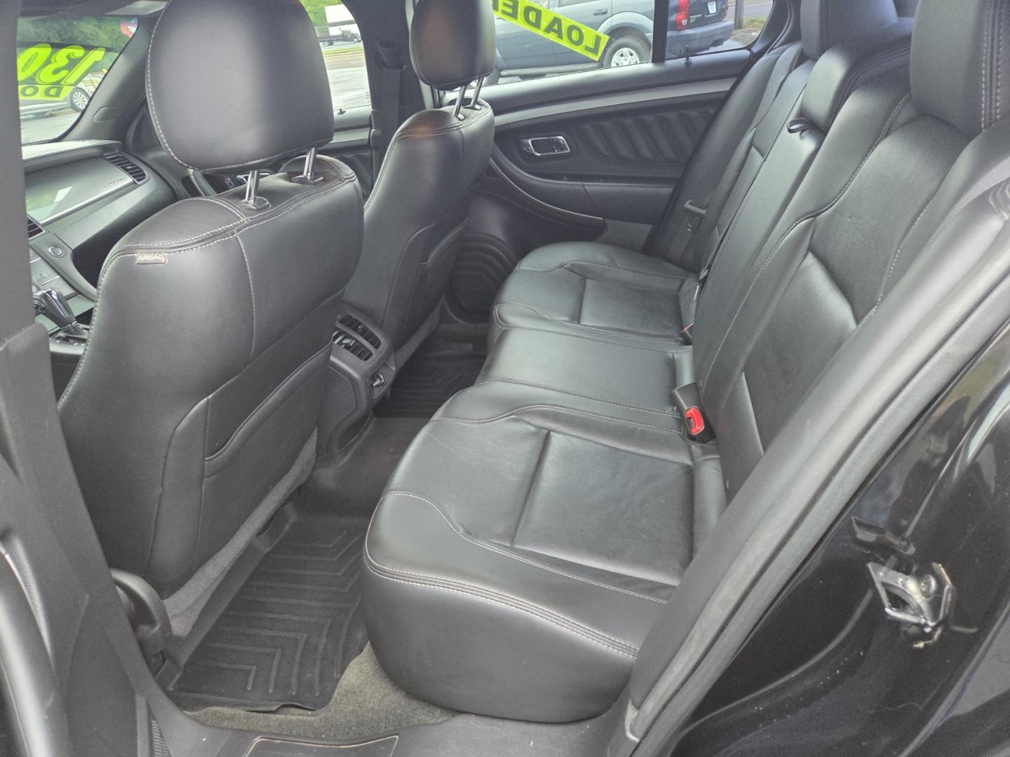 2013 BLACK /Black Ford Taurus SEL FWD (1FAHP2E80DG) with an 3.5L V6 DOHC 24V engine, 6-Speed Automatic transmission, located at 1221 Madison St., Shelbyville, TN, 37160, (931) 680-9439, 0.000000, 0.000000 - Photo#4