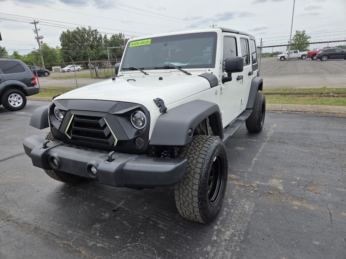 2010 WHITE /Gray Jeep Wrangler Unlimited Sport 4WD (1J4BA3H14AL) with an 3.8L V6 OHV 12V engine, Automatic transmission, located at 1221 Madison St., Shelbyville, TN, 37160, (931) 680-9439, 0.000000, 0.000000 - Photo#0