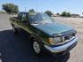 2000 Green /Gray Nissan Frontier XE King Cab 2WD (1N6DD26S9YC) with an 2.4L L4 DOHC 16V engine, Manual transmission, located at 1221 Madison St., Shelbyville, TN, 37160, (931) 680-9439, 0.000000, 0.000000 - Photo#1