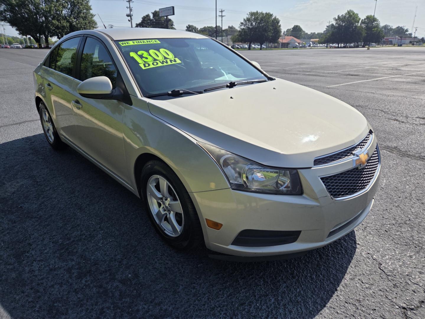 2014 Tan /Gray Chevrolet Cruze 1LT Auto (1G1PC5SB4E7) with an 1.4L L4 DOHC 16V TURBO engine, 6-Speed Automatic transmission, located at 1221 Madison St., Shelbyville, TN, 37160, (931) 680-9439, 0.000000, 0.000000- Photo#1