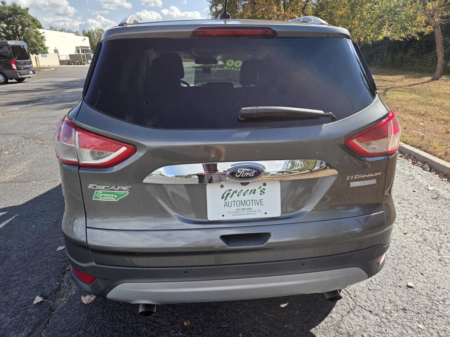 2014 Gray /Black Ford Escape Titanium FWD (1FMCU0JXXEU) with an 1.6L L4 DOHC 16V engine, 6-Speed Automatic transmission, located at 1221 Madison St., Shelbyville, TN, 37160, (931) 680-9439, 0.000000, 0.000000- Photo#2