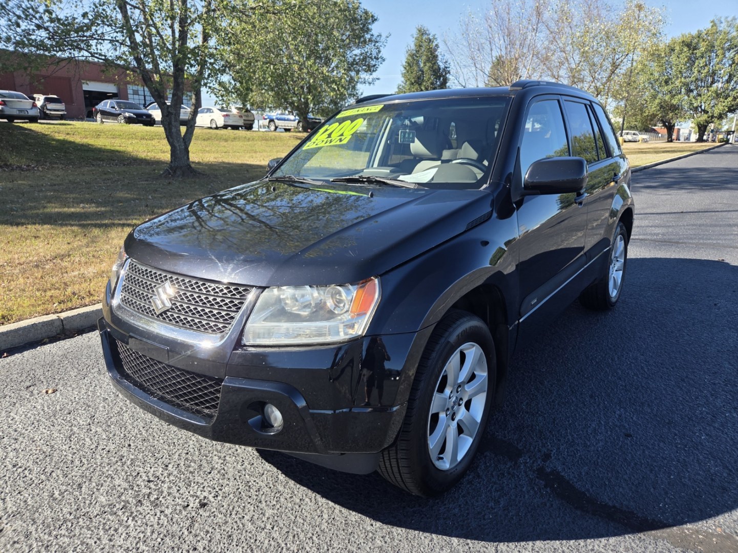2010 BLACK /Beige Suzuki Grand Vitara JLX 3.2L 4WD (JS3TD1D91A4) with an 3.2L V6 DOHC 24V engine, 5A transmission, located at 1221 Madison St., Shelbyville, TN, 37160, (931) 680-9439, 0.000000, 0.000000- Photo#0